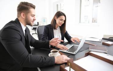 Young Team of Lawyers at Workplace